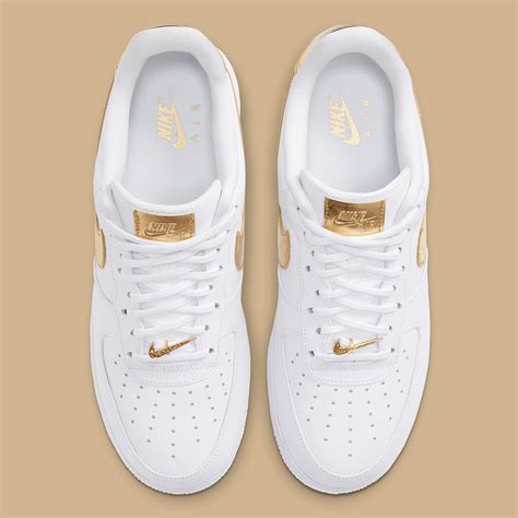 nike air force weiß mit gold|Nike Air Force 1 gold shoes.